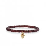 Gold & Diamond Hamsa on Garnet