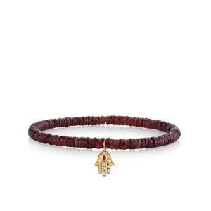 Gold & Diamond Hamsa on Garnet